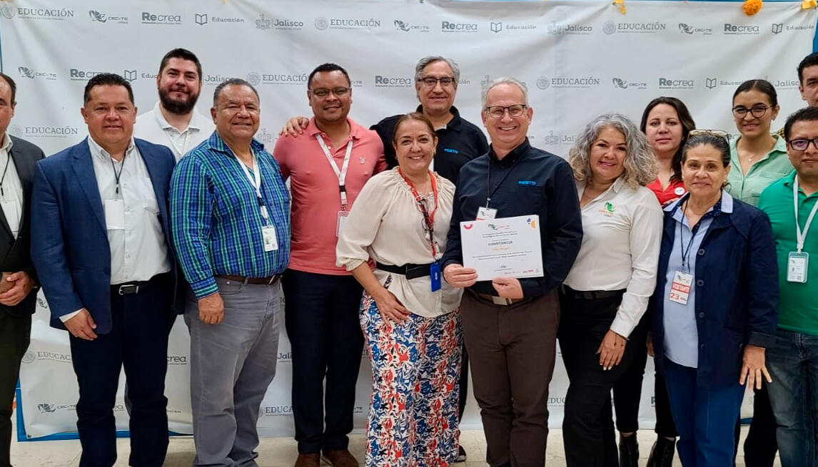 Group photo of Mike Nager with Mexican educators after a smart manufacturing workshop